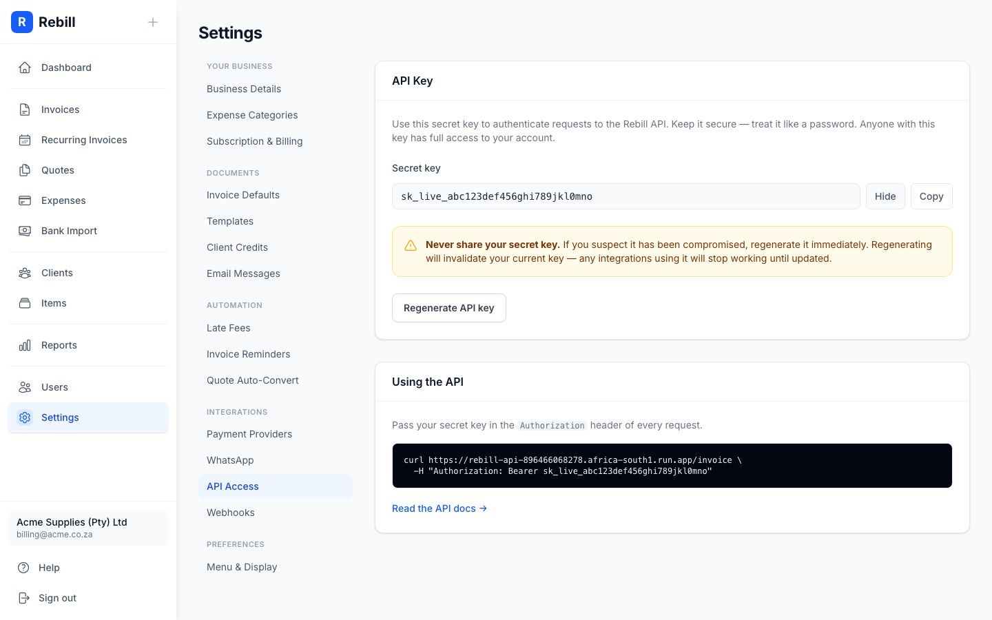 Rebill API key management screen showing a revealed API key with rotate and revoke controls