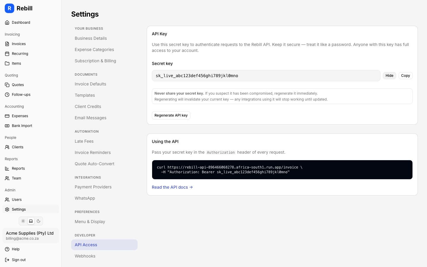 Rebill API key management screen showing a revealed API key with rotate and revoke controls